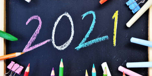 2021 Hand writing chalk on blackboard, Happy new year concept, back to school